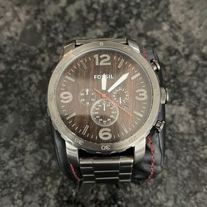 Used Fossil watch. Shows signs on wear. Needs a new battery